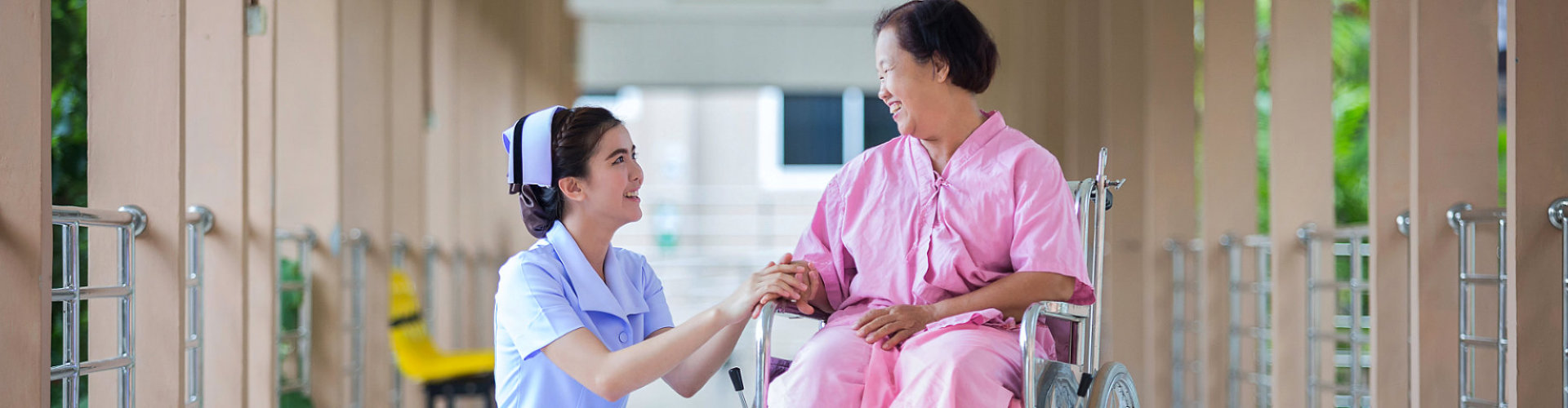 young nurse and old lady talking